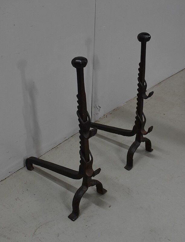 Pair of wrought iron chenets - late nineteenth century