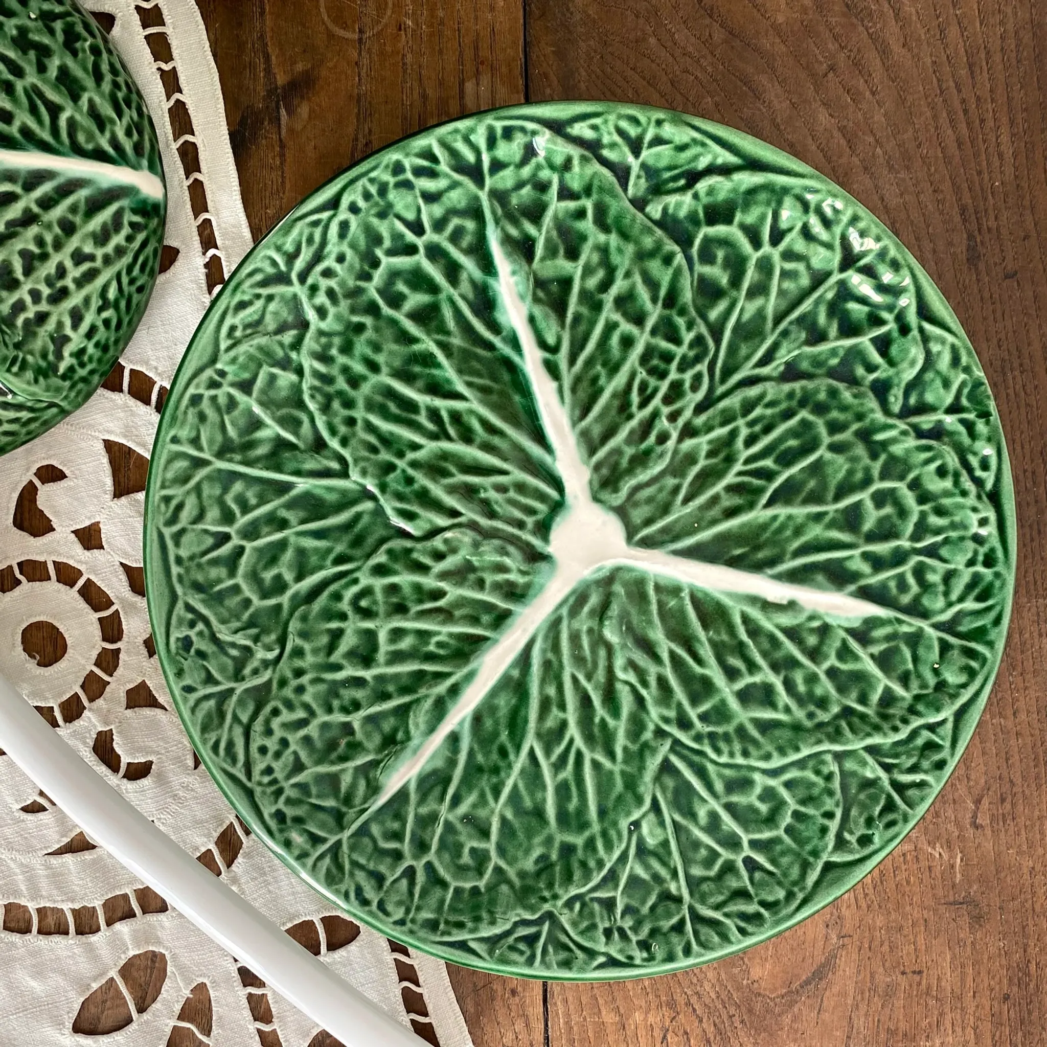 Large soup tureen in earthenware with a cabbage design, along with a dish and spoon.
