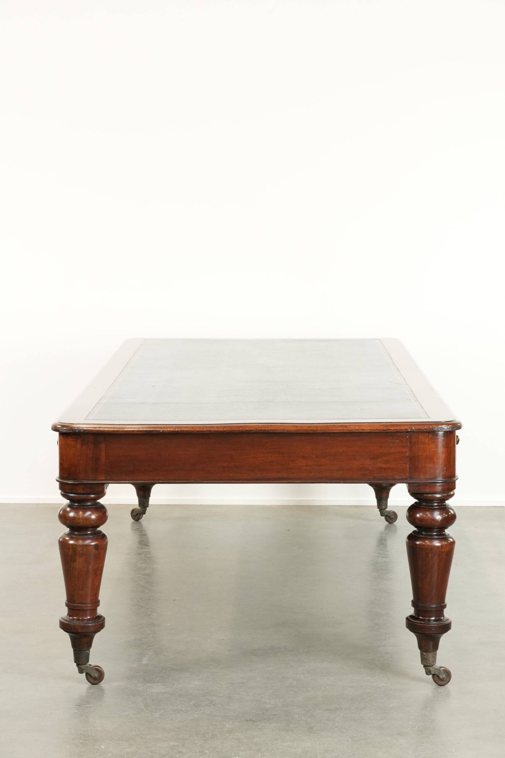 Antique English library table / writing table / desk from the 19th century