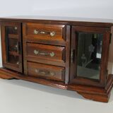 Wooden jewelry box in the shape of a dresser