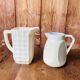 A pair of vintage ceramic jugs from the 1950s.