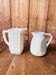 A pair of vintage ceramic jugs from the 1950s.