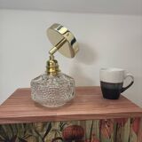 Gold tilting wall light