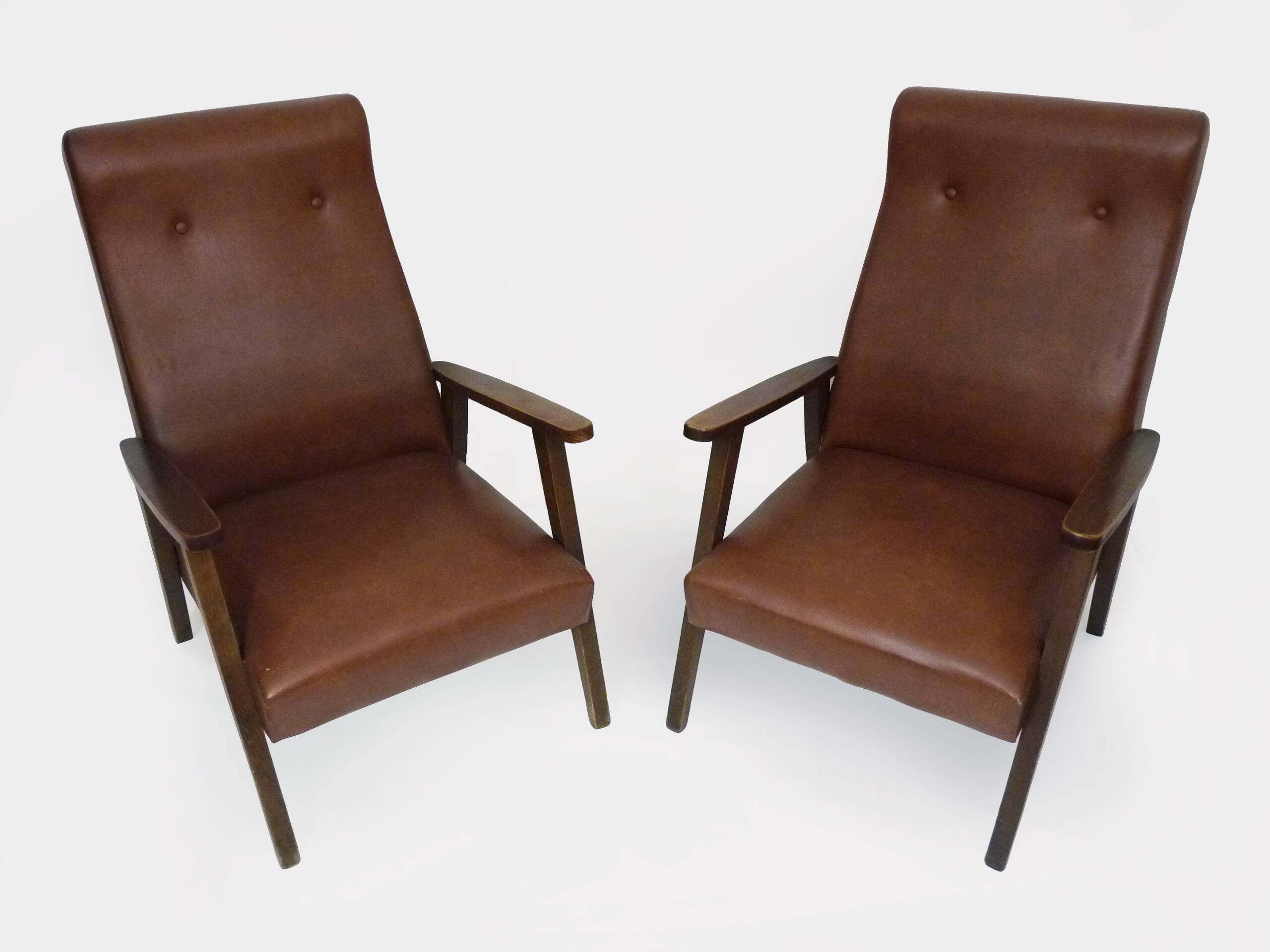 Pair of Scandinavian armchairs in brown leatherette and wood from the 50s and 60s