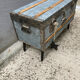 Old zinc trunk with legs, industrial console