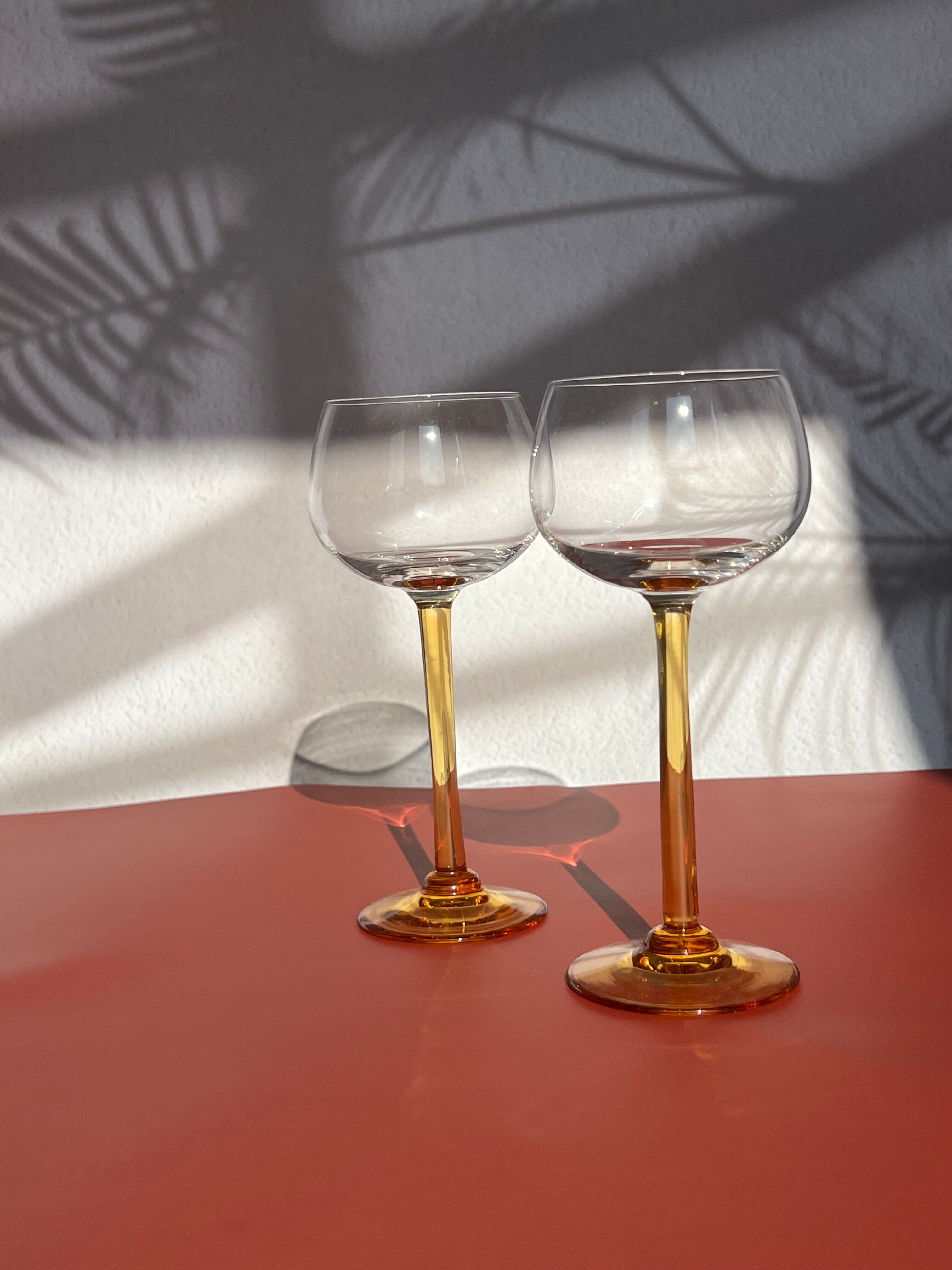 Pair of glass balloon vintage style Luminarc foot rod orange