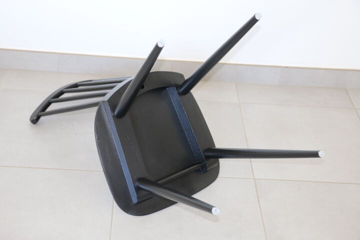 4 black Baumann V5 chairs