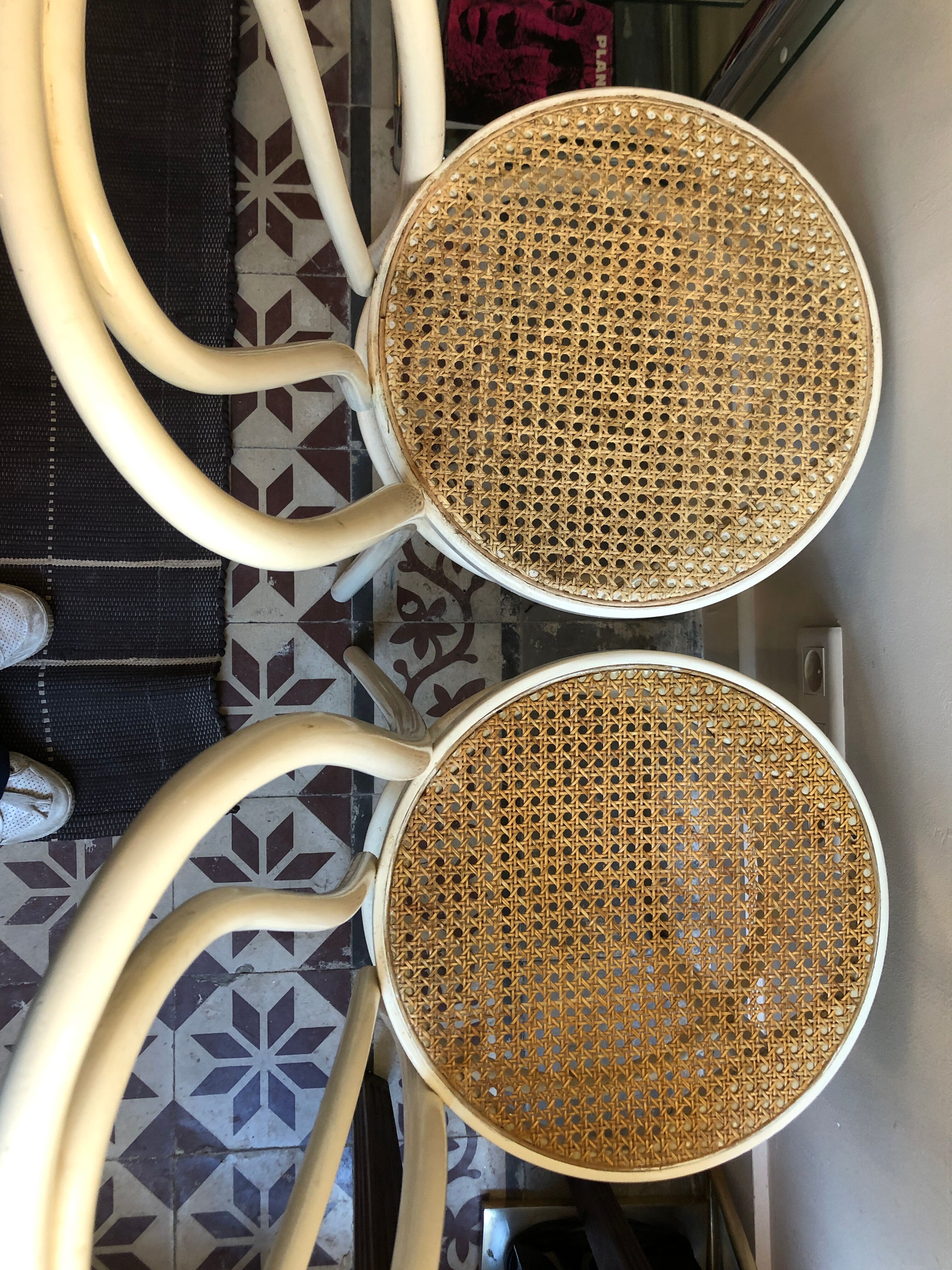 Couple of white bistro chairs