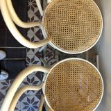Couple of white bistro chairs