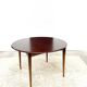 Danish round dining table in rosewood – 1950s design with butterfly extension.