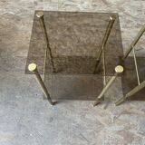 Pair of glass side tables with gilded feet