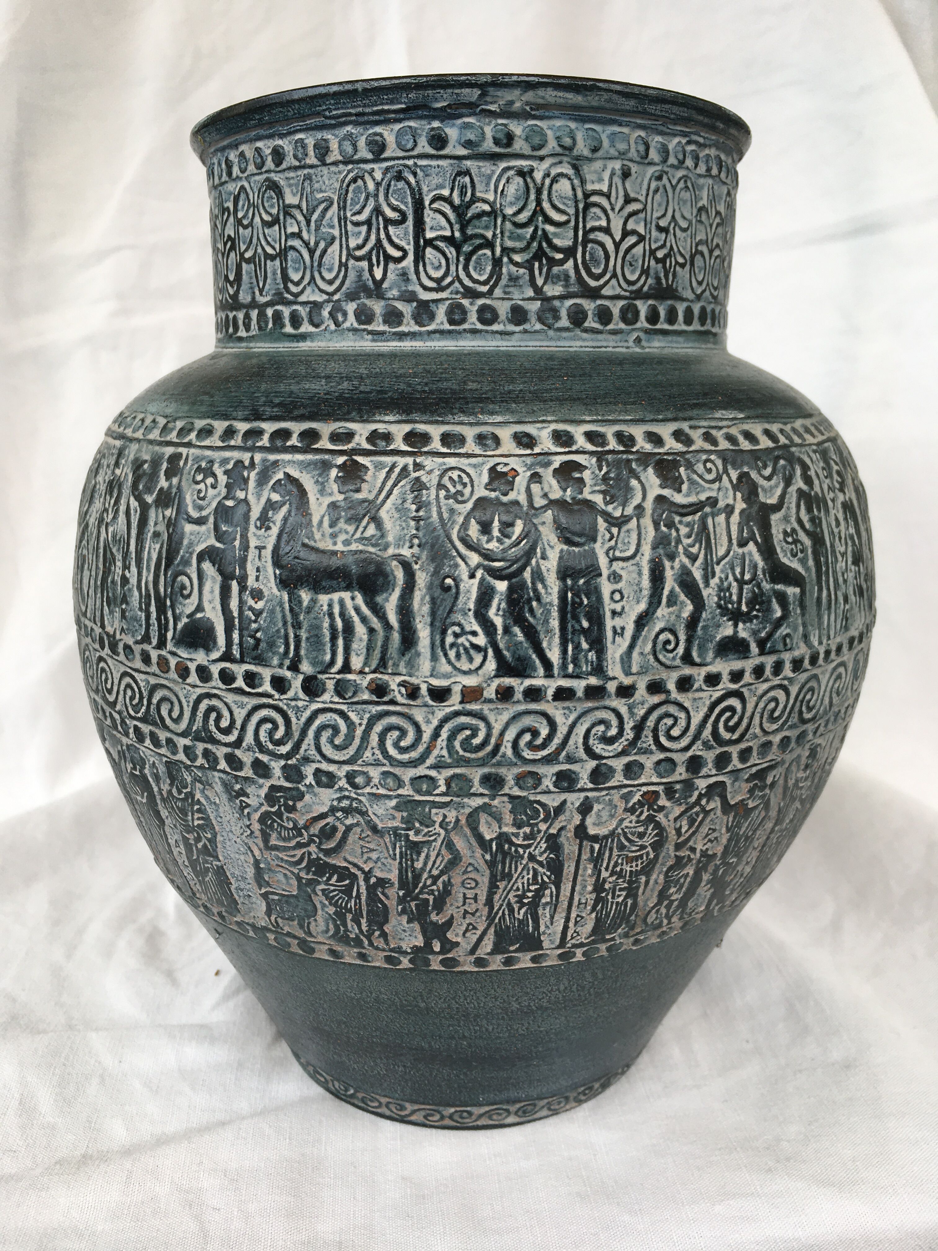 Vase decorated with friezes of ancient inspiration.