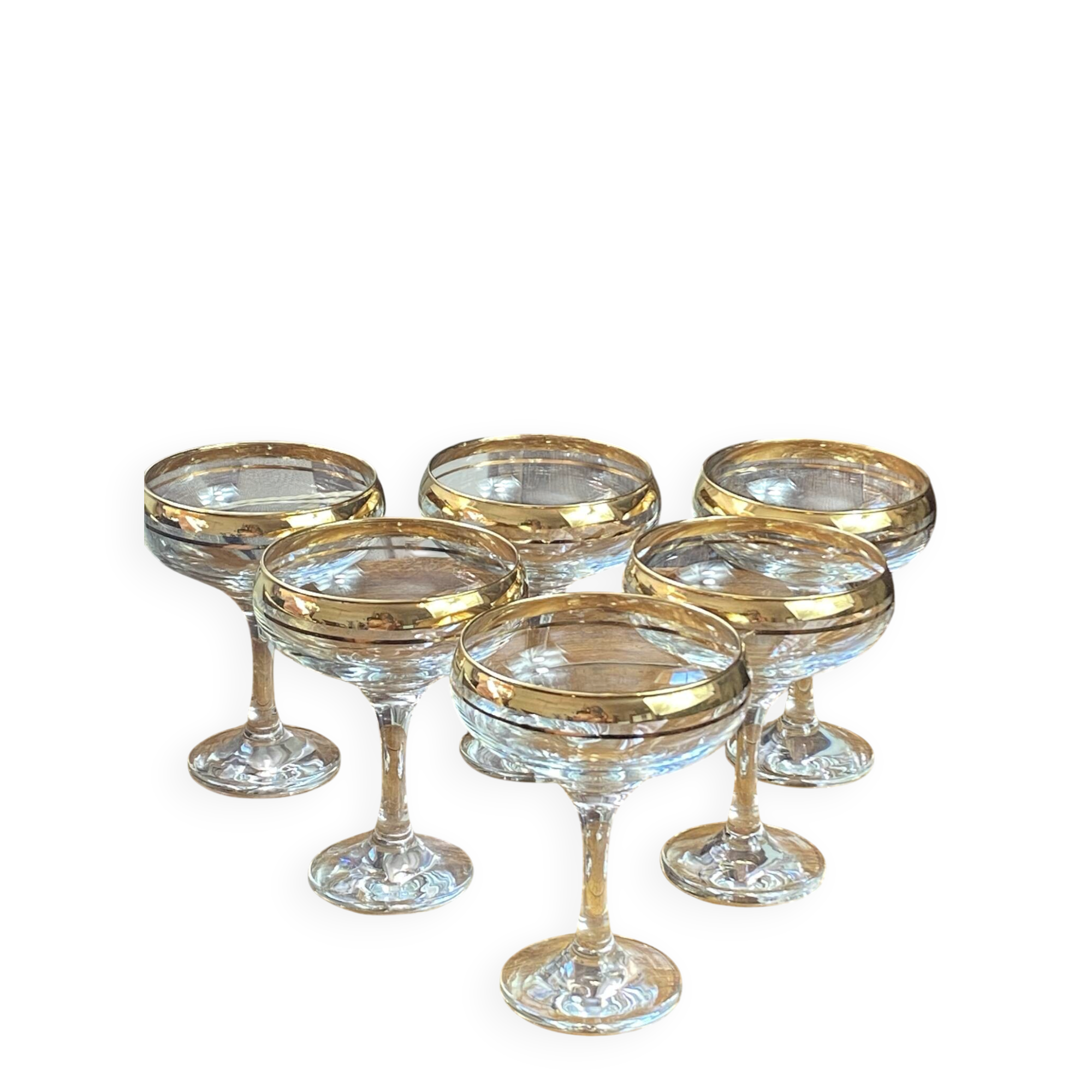 Champagne coupes or cocktail glasses with gilding