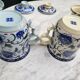 Paire de tasse à thé, couvercle et infuseur