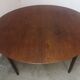 Scandinavian extendable round dining table in teak