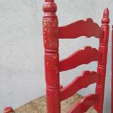 2 vintage red straw chairs