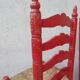 2 vintage red straw chairs