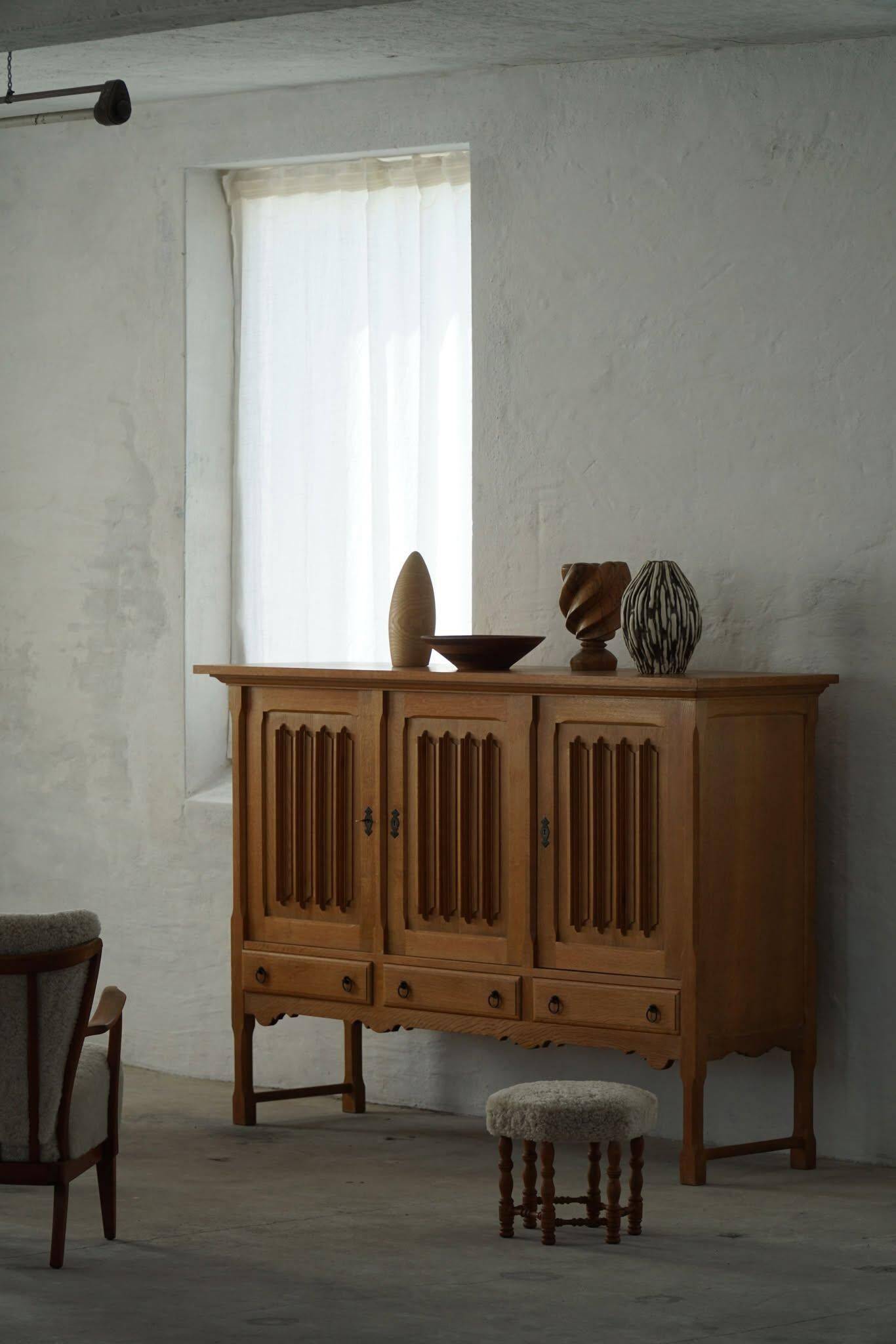 Brutalist oak sideboard, mid-century Danish design, Kjærnulf style, 1960s.