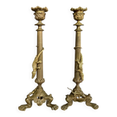 Pair of 19th-century gilded bronze candlesticks in Empire style.