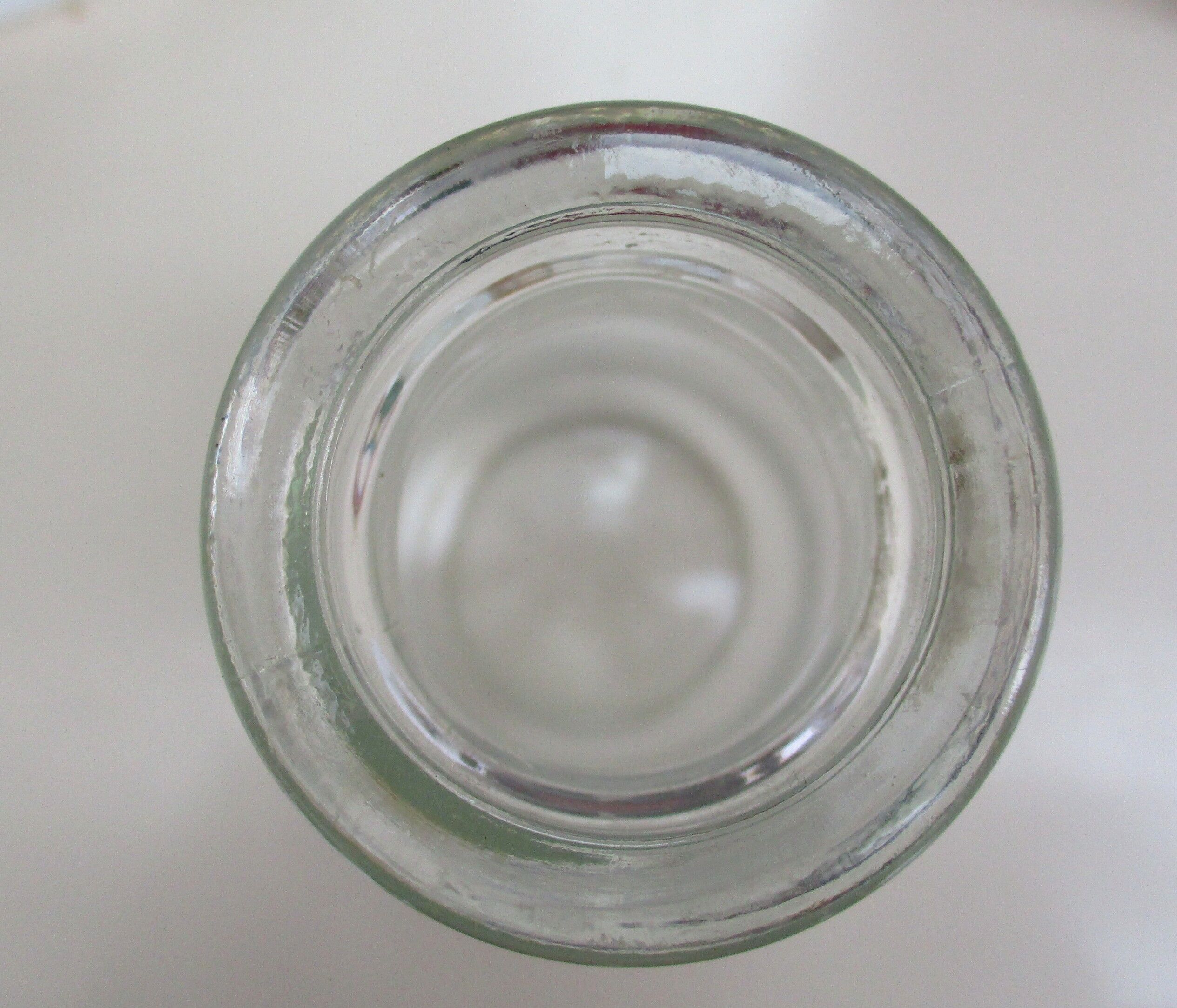 Vintage milk bottle in clear glass