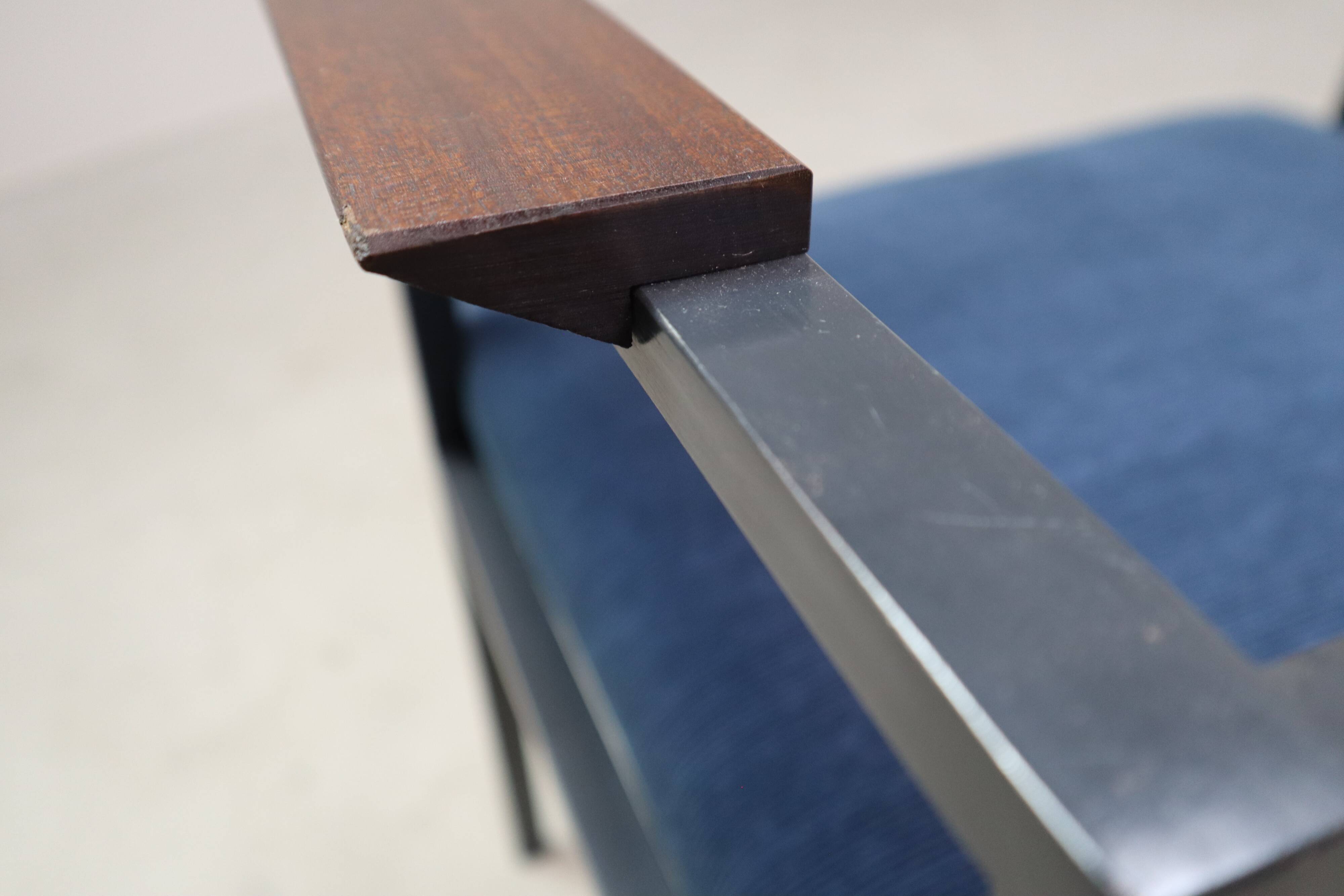 Pair of Postmodern armchairs in steel and mahogany, 1970s