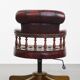 Fauteuil de bureau Chesterfield pivotant classique rouge en cuir de vachette sur roulettes