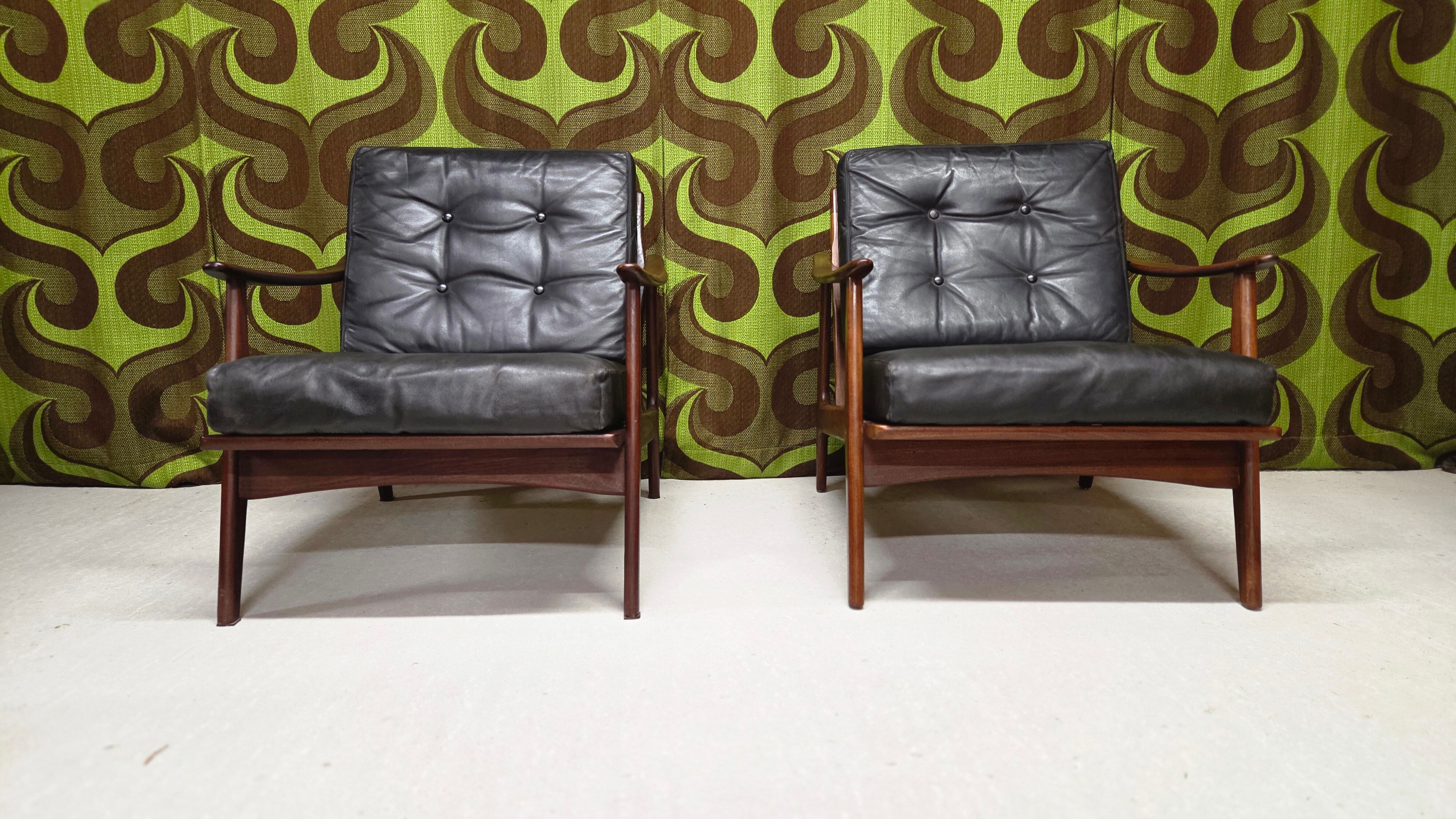 Pair of Scandinavian teak leather armchairs