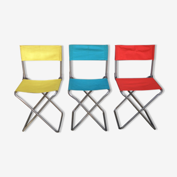 Set of three folding fabric chairs