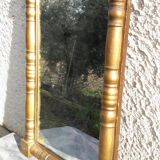 Mirror gilded frame decorated with balusters