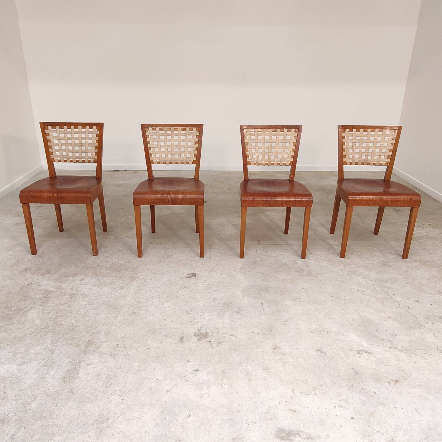 Series of 4 wood and strap chairs by Krasna Jizba Year 40