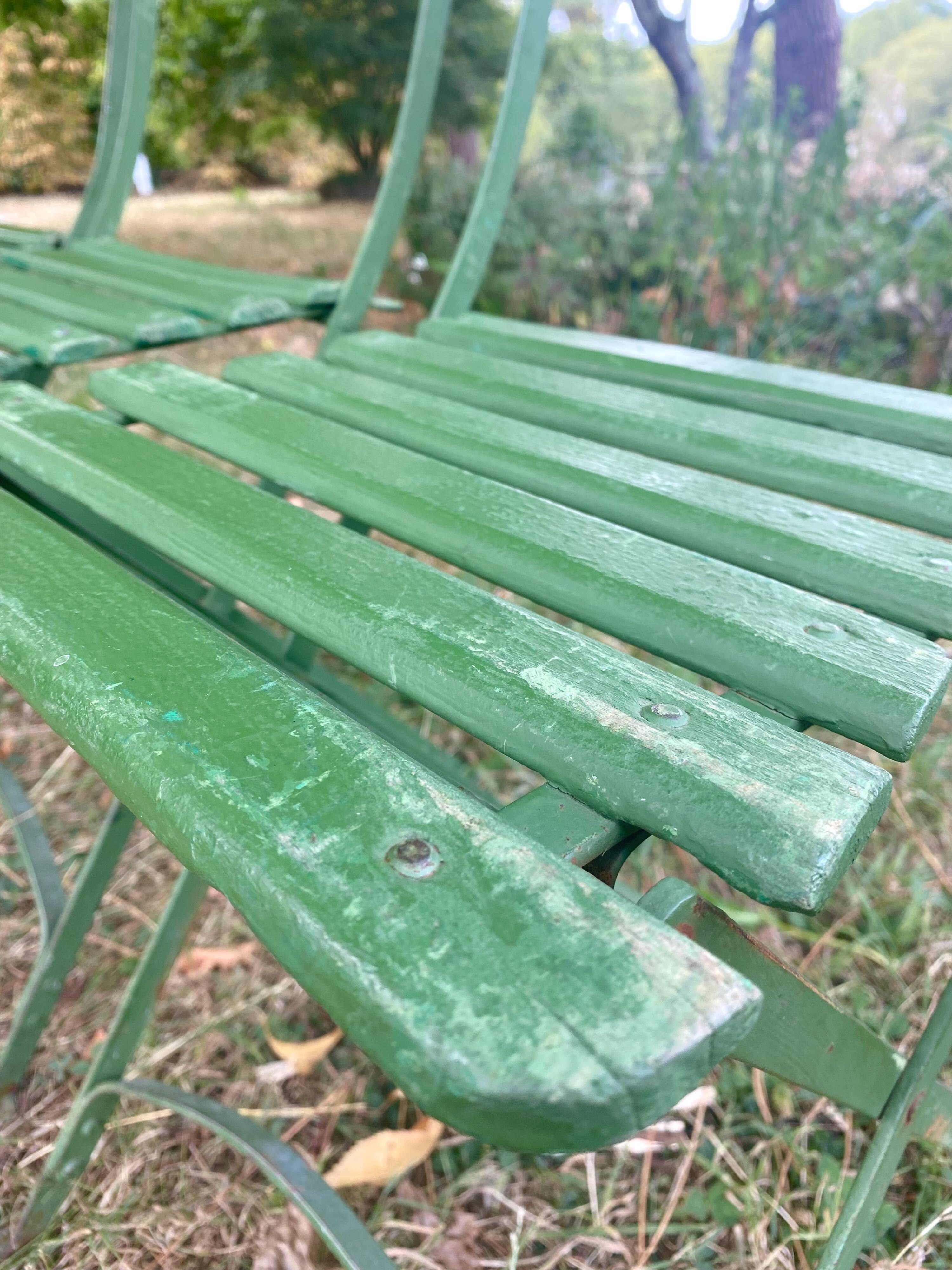 Antique folding garden chairs with wooden slats