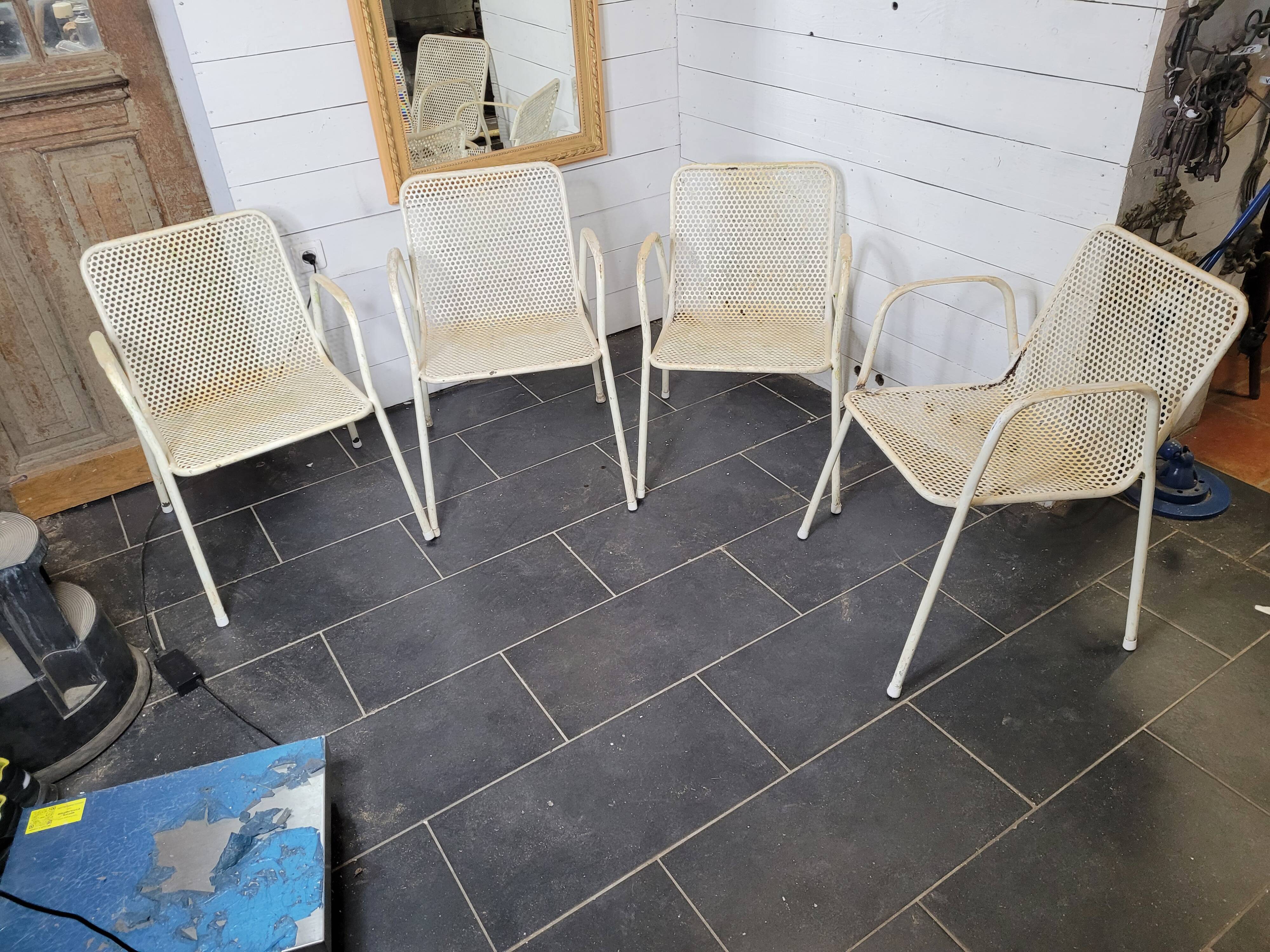 4 perforated metal garden armchairs