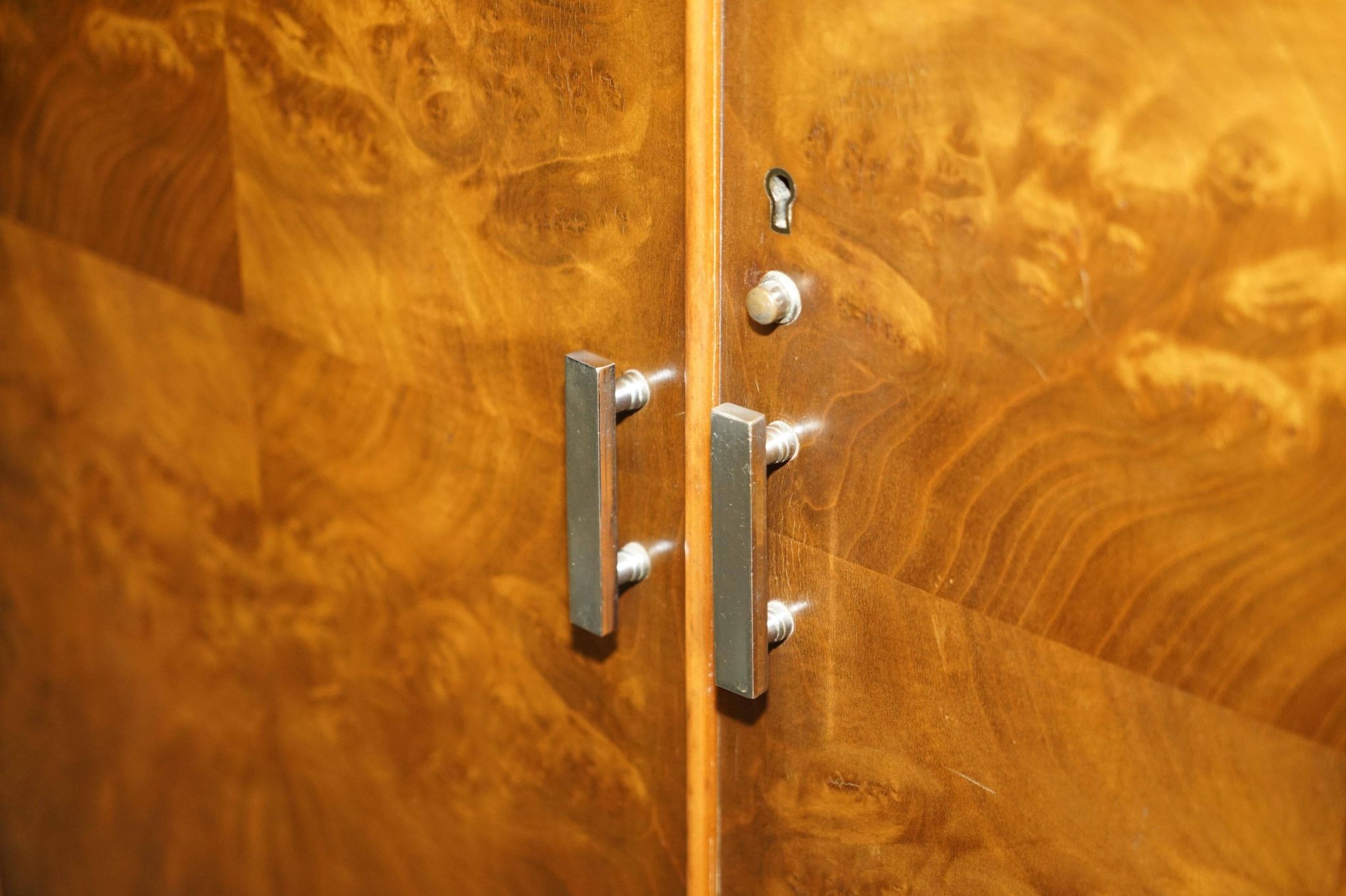 Art Deco governess wardrobe in burr walnut by Waring & Gillow