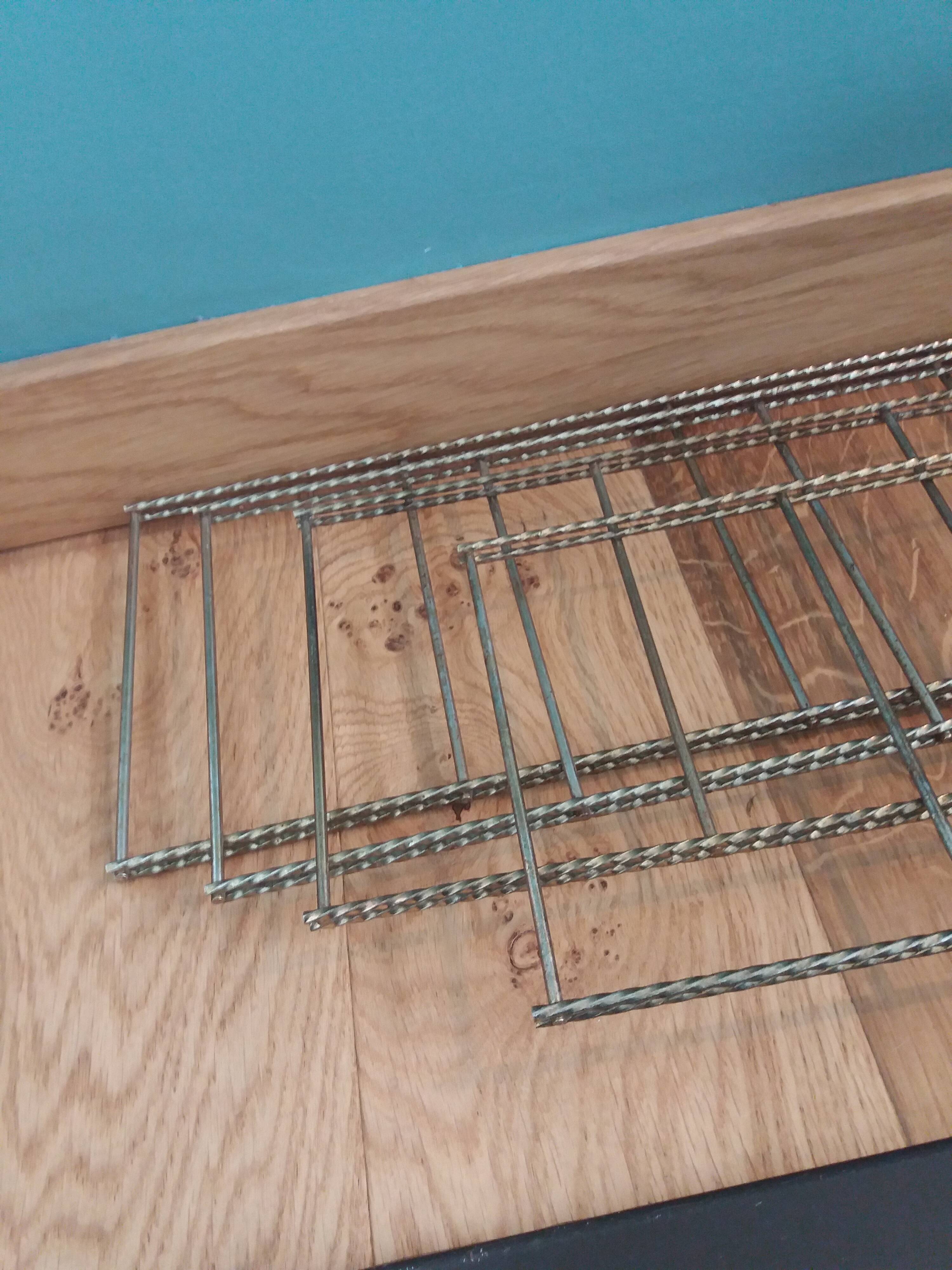 String twisted metal wall shelves