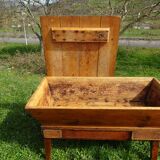Very old solid oak dough trough with a lid and removable legs.