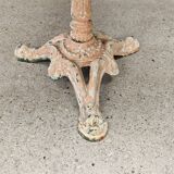 Bistro table with cast iron base and solid teak top