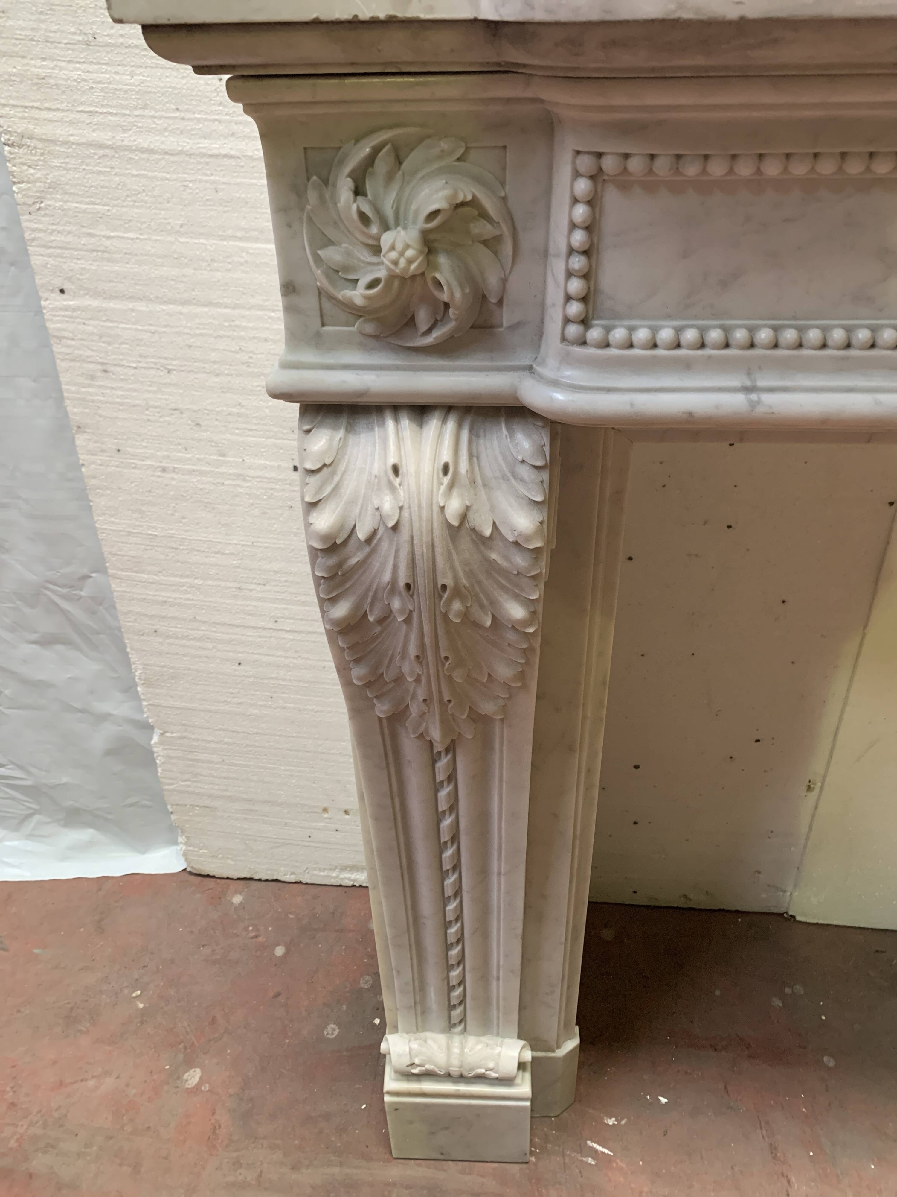 Louis XVI style fireplace in white Carrara marble, 19th century