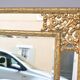 Miroir doré de style régence