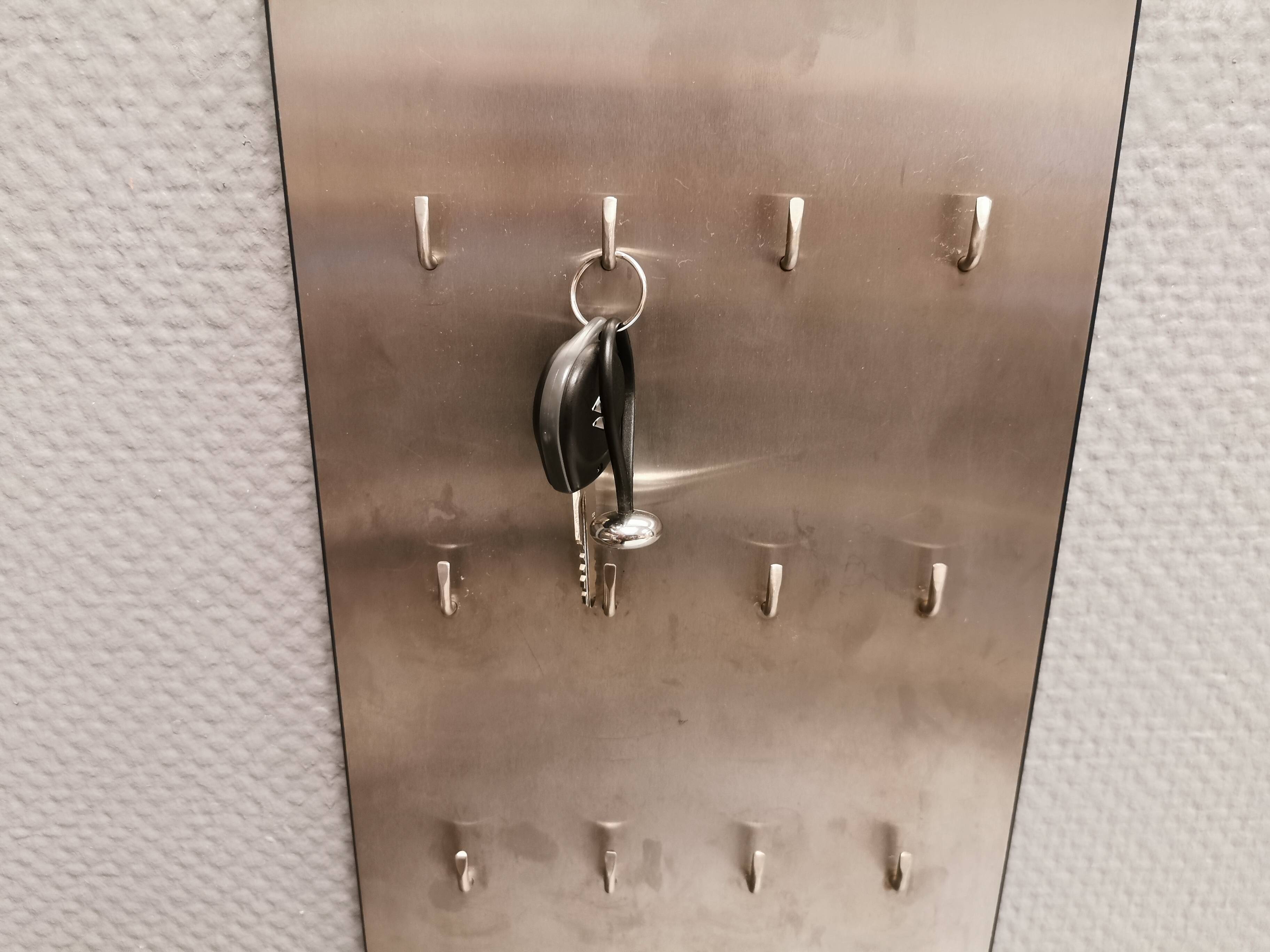 George Jensen key hanging board in brushed steel in classic Danish design.