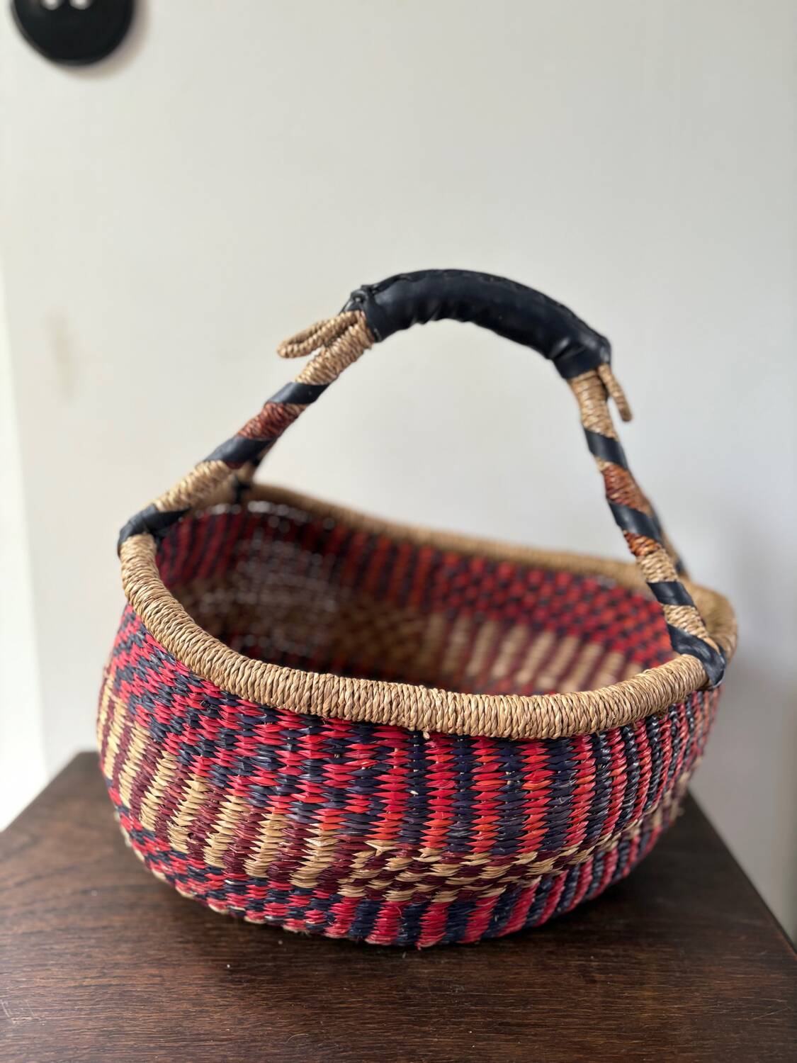 Vintage colorful woven rush ethnic basket