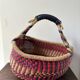Vintage colorful woven rush ethnic basket