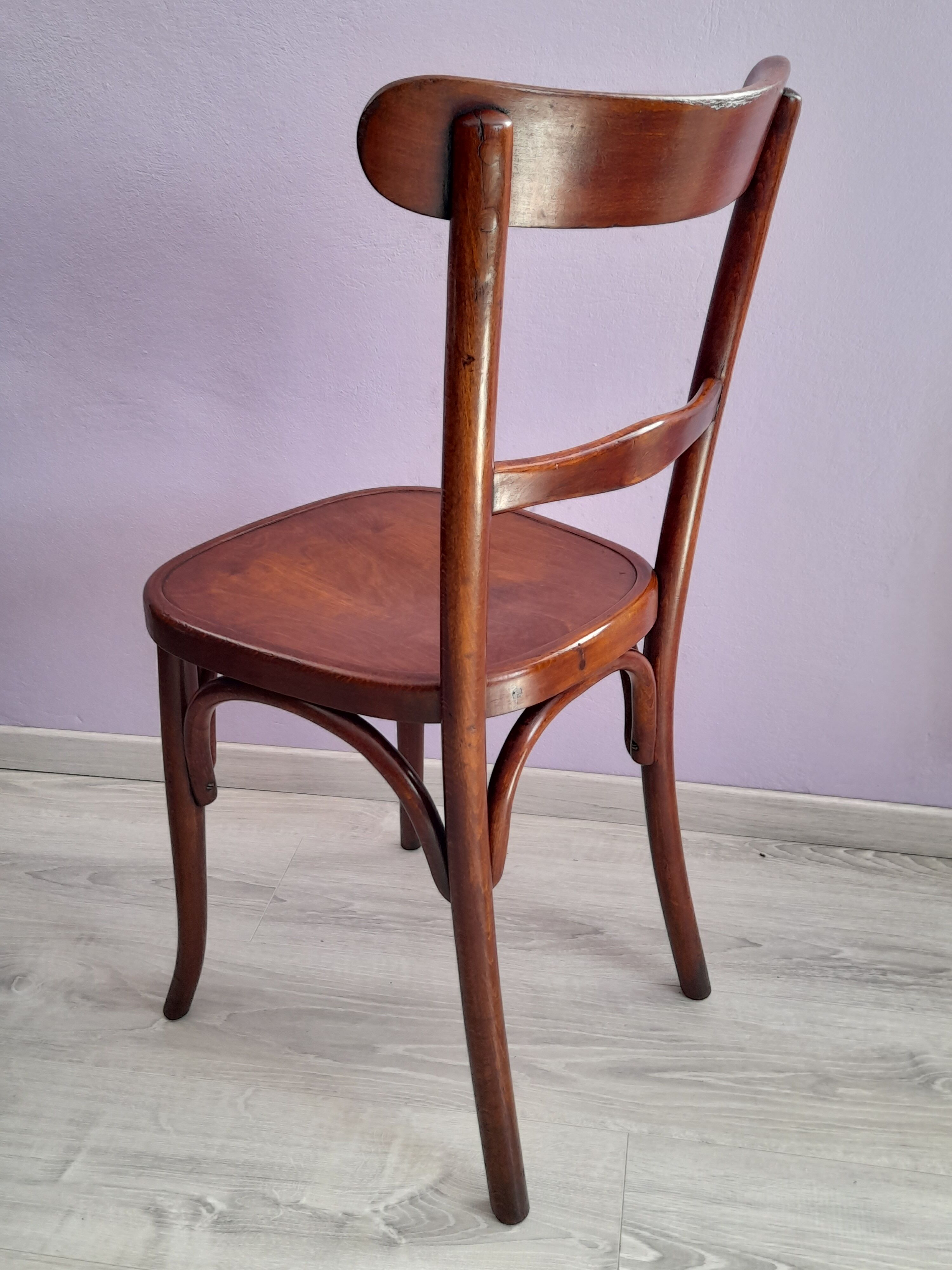 Suite of 4 bistro chairs, published by fischel