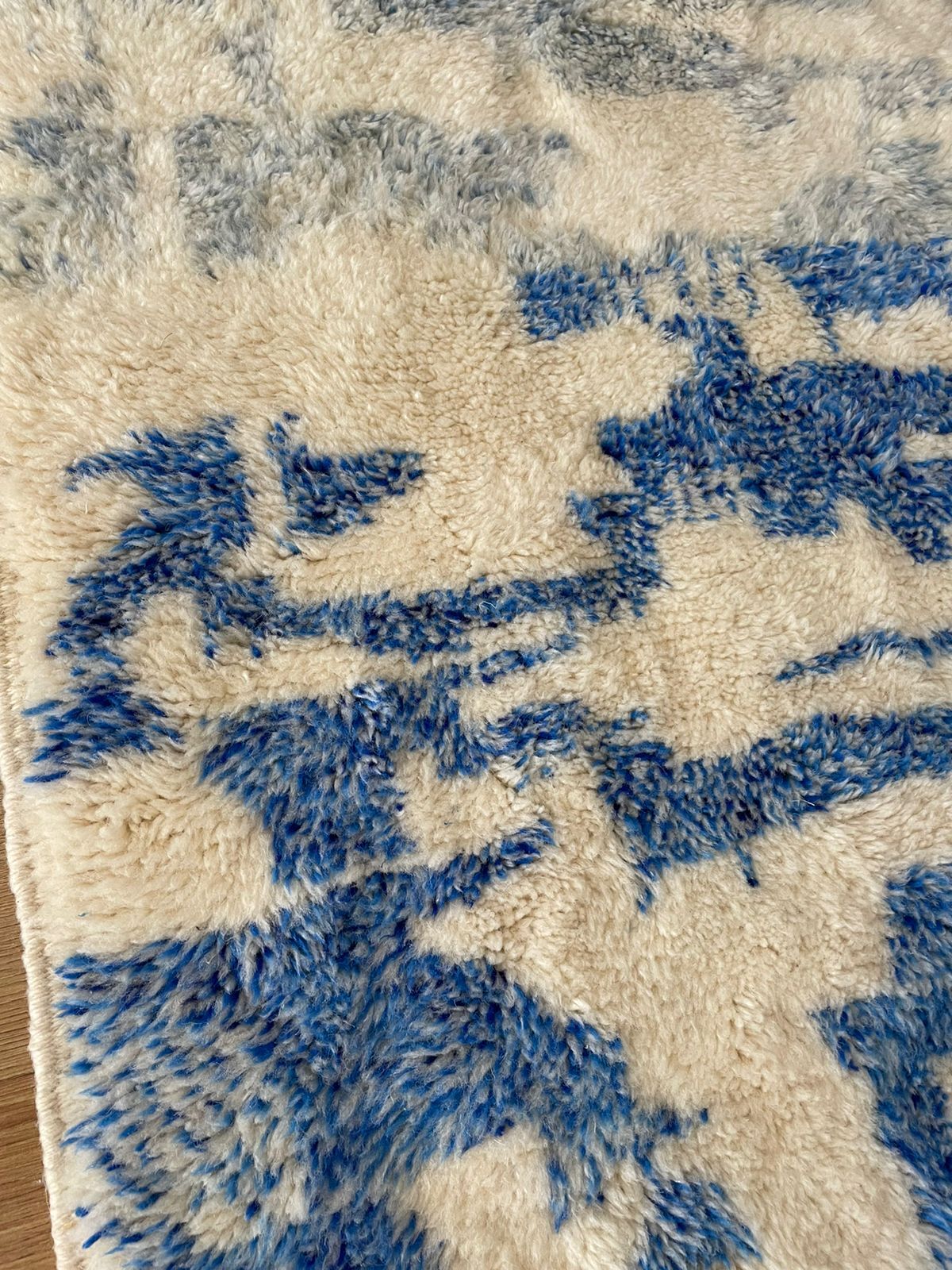 Berber carpet with blue patterns