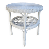 Round white rattan side table with storage underneath, circa 1970.