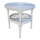 Round white rattan side table with storage underneath, circa 1970.