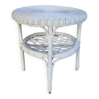 Round white rattan side table with storage underneath, circa 1970.
