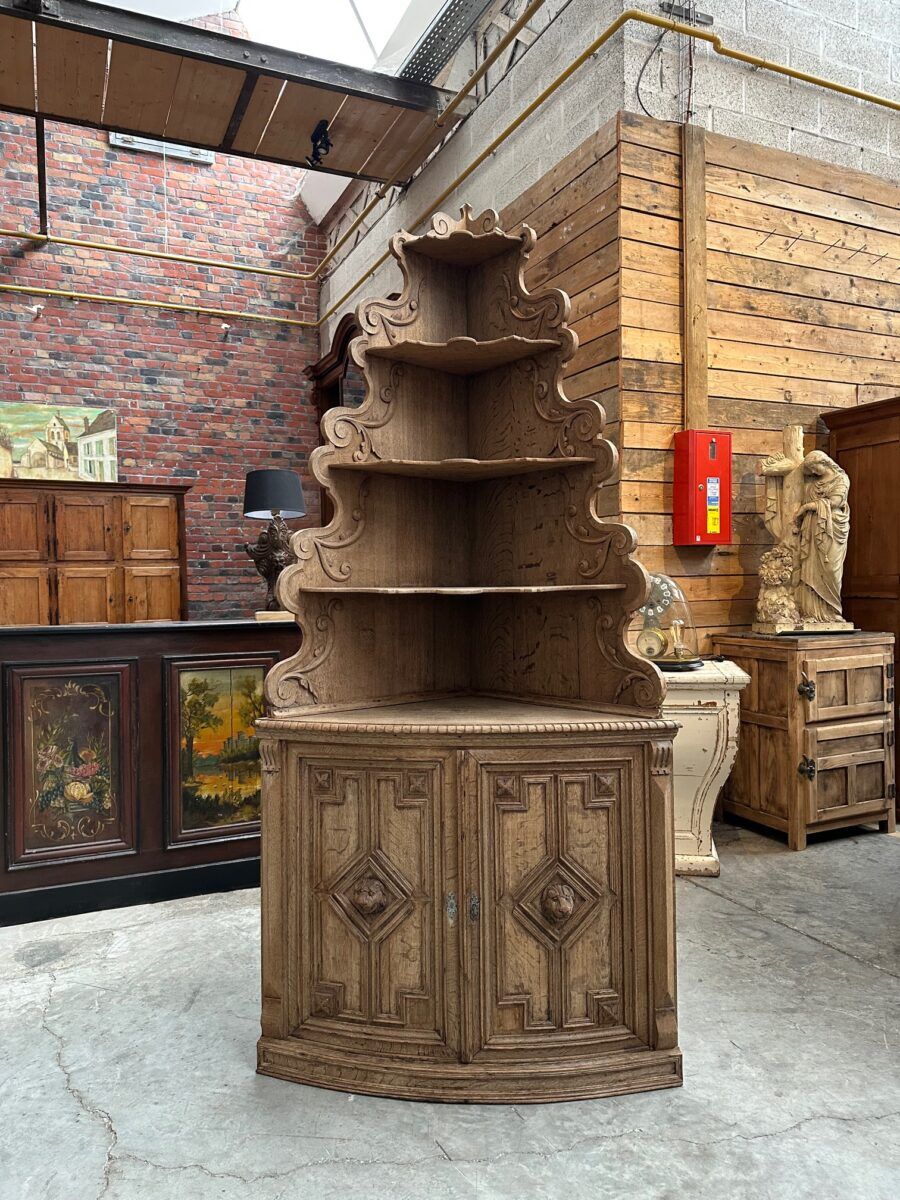 Corner cabinet in oak, late 19th century.