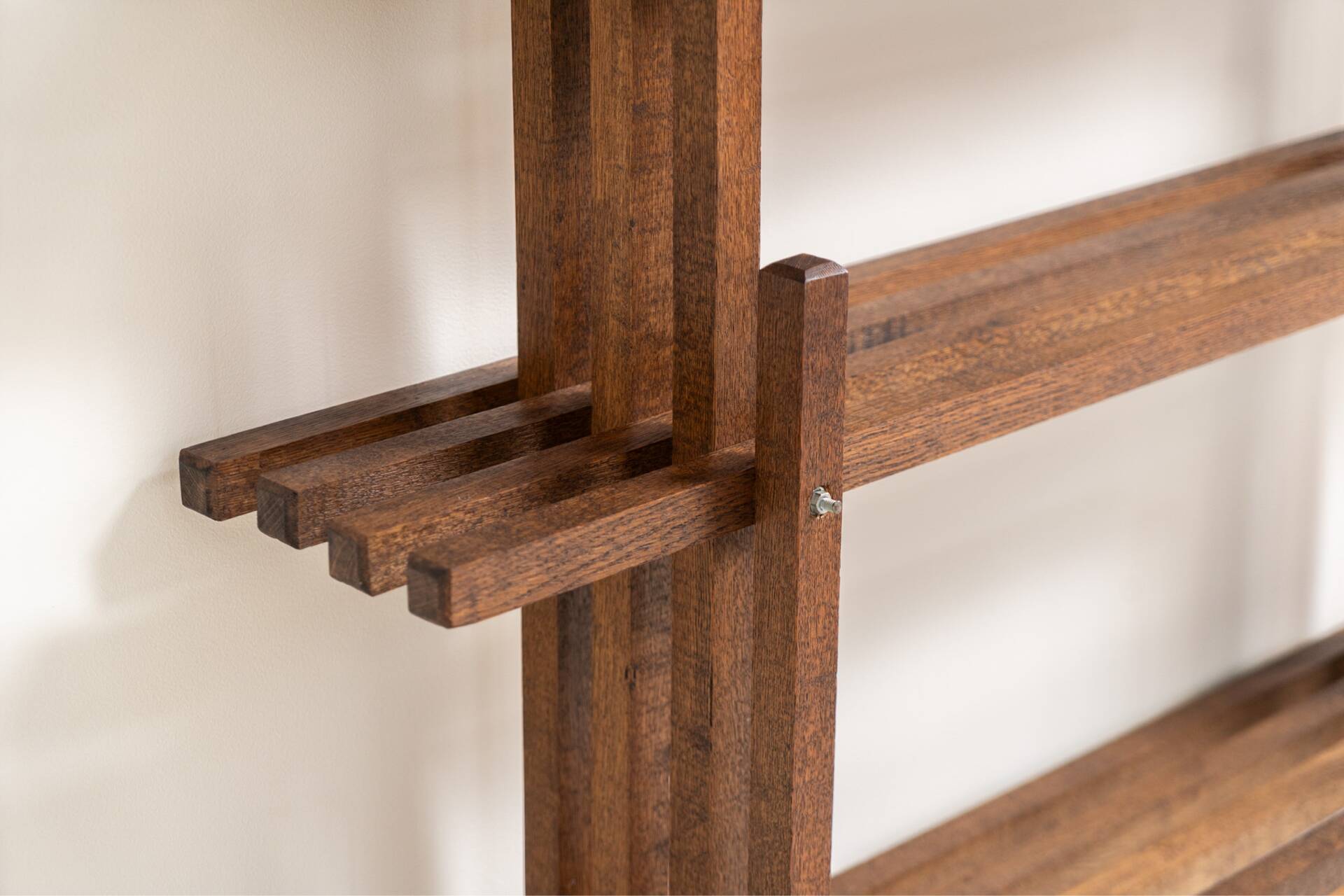 Sculptural wengé slat bookcase (Europe, 1960s).