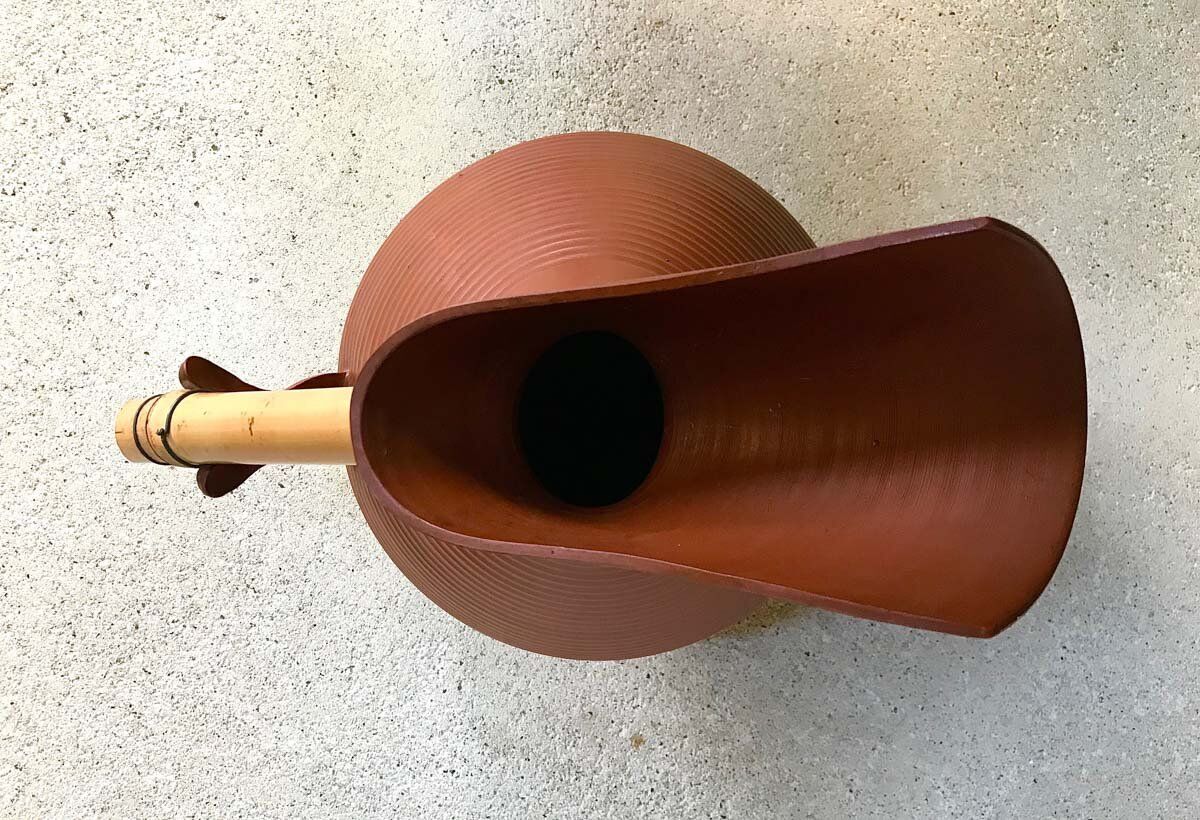 Studio pottery jug floor vase in terracotta and bamboo handle Germany 1950s