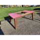 1960s oak dining table with integrated extensions.